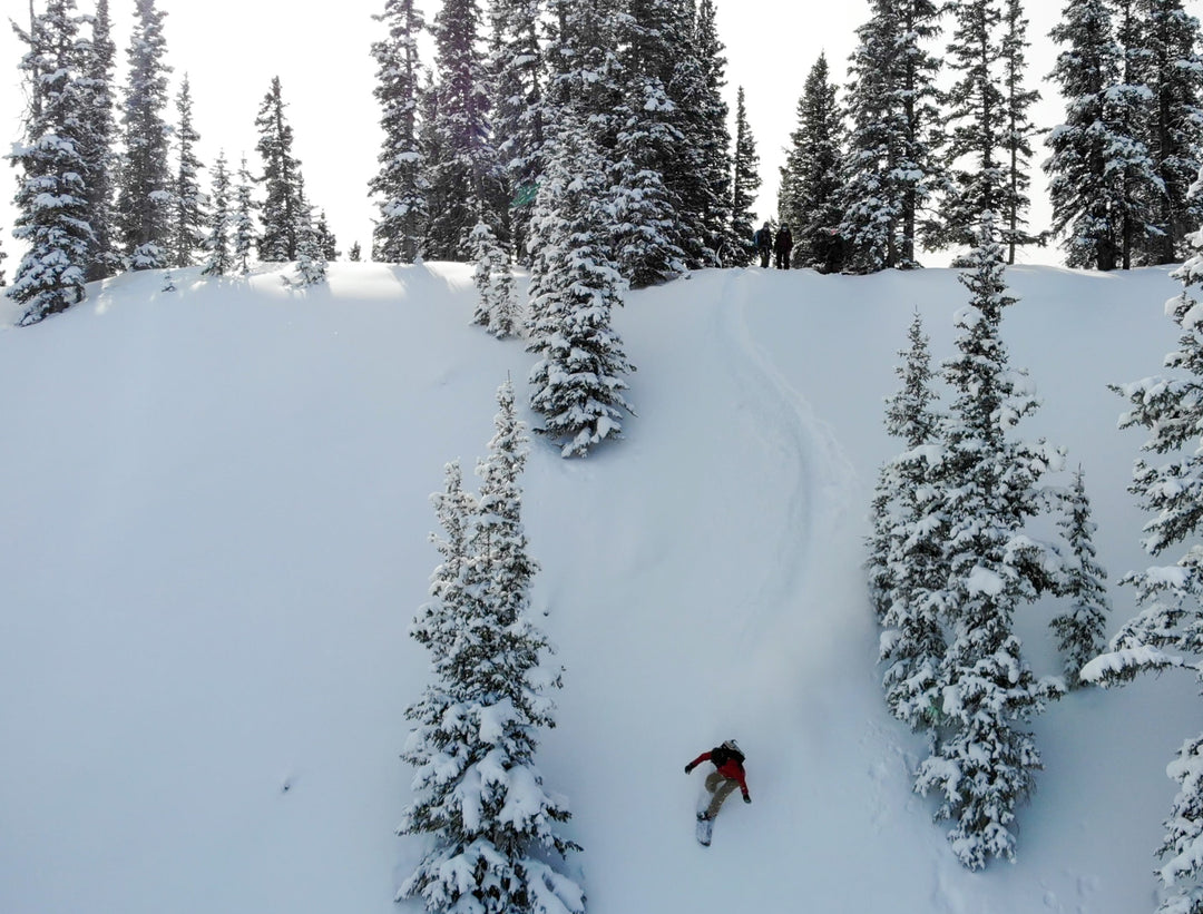snowboarding down mountain